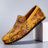 Leren herenloafers met bloemmotief